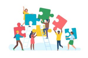 Dessin illustrant des hommes et des femmes rassemblent de grandes pièces de puzzle en couleur